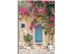Bild blauen Tür und Blütenpracht